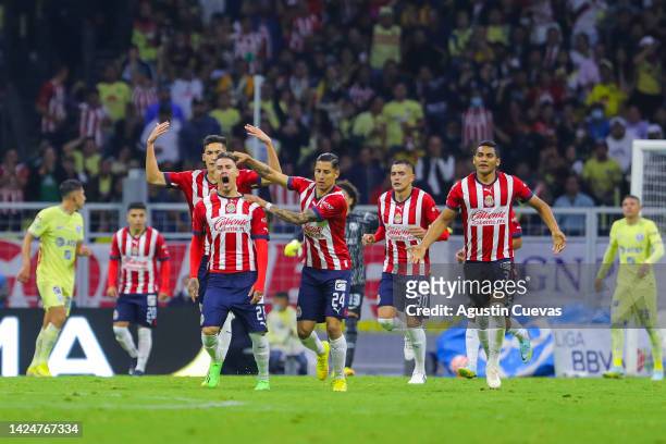 Cristian Calderon of Chivas celebrates after scoring the first goal of his team during the 15th round match between America and Chivas as part of the...