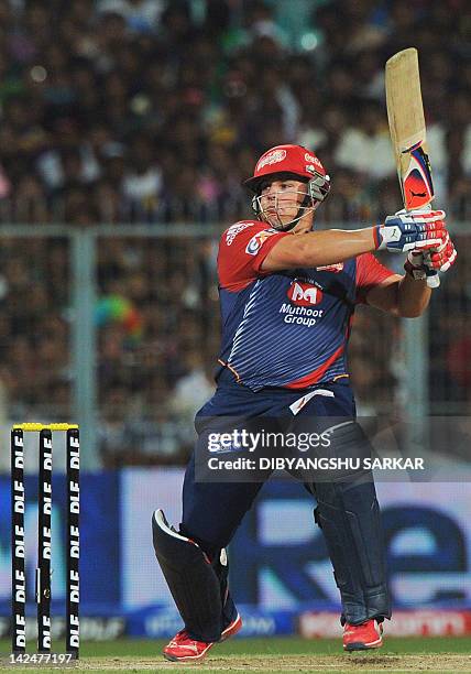 Delhi Daredevils' batsman Aaron Finch plays a shot during the IPL Twenty20 cricket match between Kolkata Knight Riders and Delhi Daredevils at The...