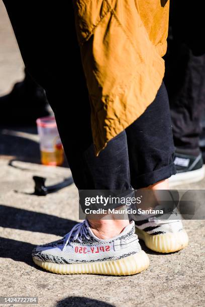 Festival-goer wearing Adidas Yeezy Boost sneakers during Coala Festival 2022 at Memorial da America Latina on September 17, 2022 in Sao Paulo, Brazil.