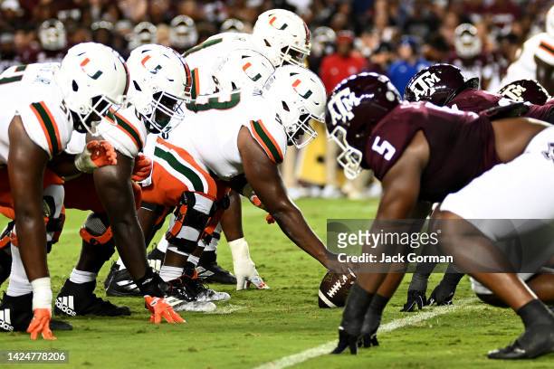 Jakai Clark of the Miami Hurricanes looks to snap the ball against the Texas A&M Aggies during the first half of the game at Kyle Field on September...