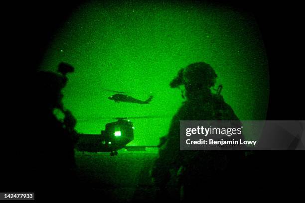 An American blackhawk helicopter lands as Soldiers with the 509th Infantry Division and the 3rd Infantry's Aviation Brigade launched a joint air...