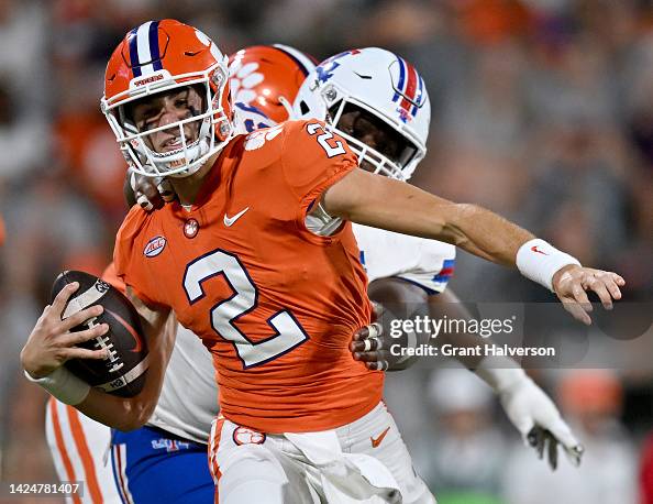 A Rasheed Lala Rasheed Lyles of the Louisiana Tech Bulldogs pressures Cade Klubnik ...