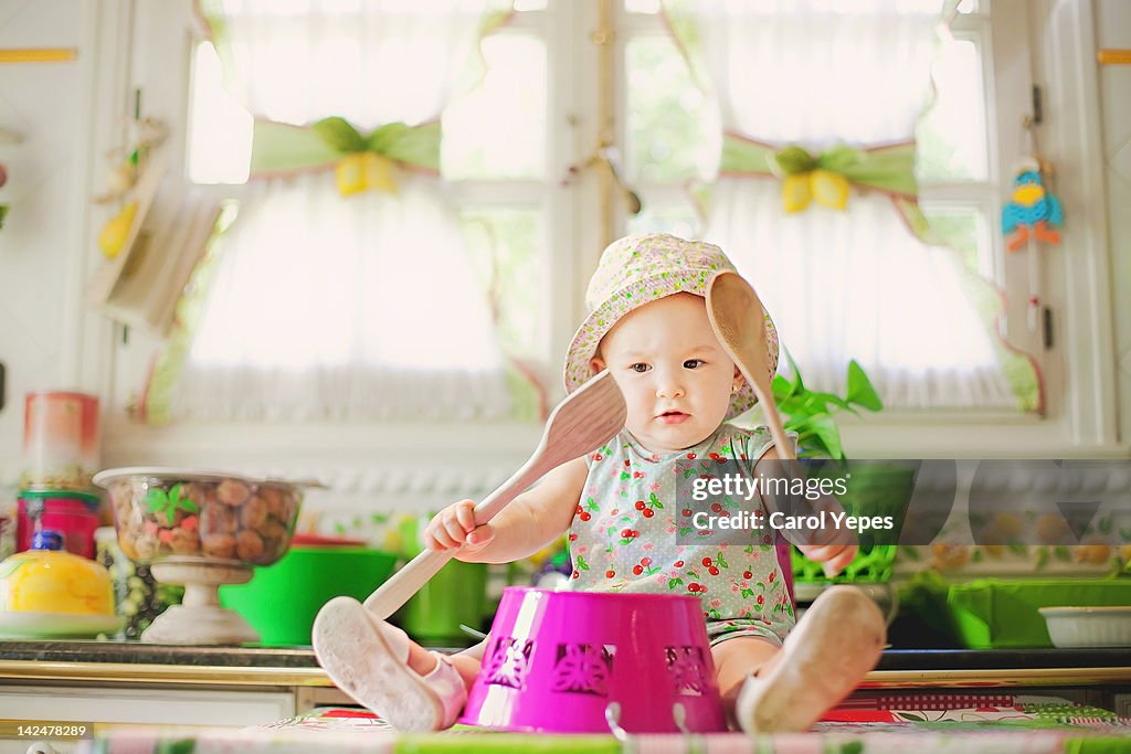 Baby girl playing drums