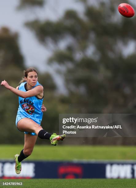 Aoife Berry of the Meledy's kicks the ball during the match between the Woomeras and the Medleys at Casey Fields on September 18, 2022 in Melbourne,...