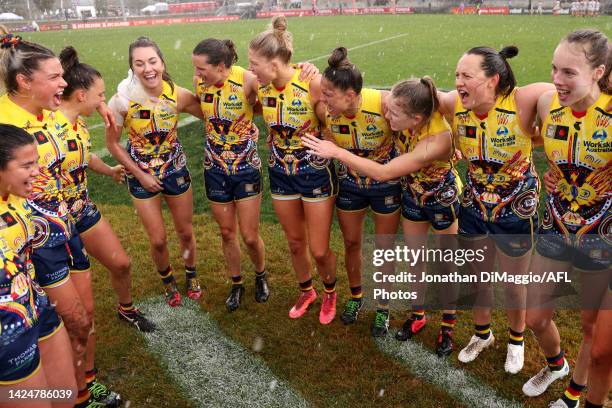 Adelaide players are pictured singing the song during the round four AFLW match between the Collingwood Magpies and the Adelaide Crows at Victoria...