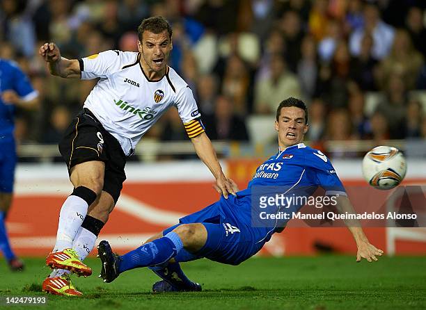 Roberto Soldado of Valencia CF competes for the ball with Nick Viergever of AZ Alkmaar during the UEFA Europa League quarter final second leg match...