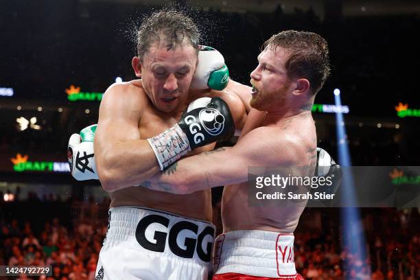 Canelo Alvarez and Gennadiy Golovkin exchange punches in the fight for the Super Middleweight Title at T-Mobile Arena on September 17, 2022 in Las...