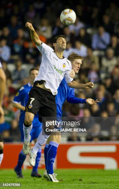 Valencia«s Brazilian forward Jonas Gonsalves vies with AZ Alkmaar's midfielder Rasmus Elm during the UEFA Europe League quarter final second leg...