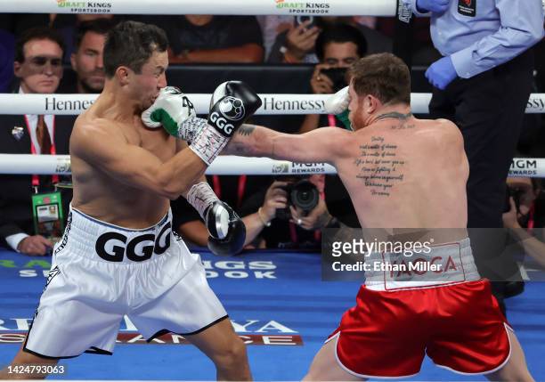 Canelo Alvarez hits Gennadiy Golovkin in the first round of their super middleweight title fight at T-Mobile Arena on September 17, 2022 in Las...