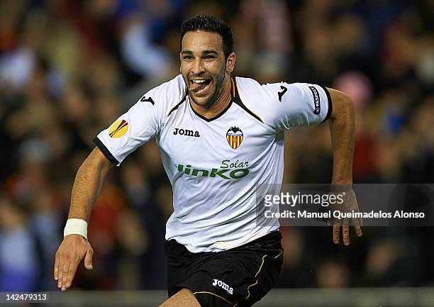 Adil Rami of Valencia CF celebrates after scoring the second goal during the UEFA Europa League quarter final second leg match between Valencia CF...