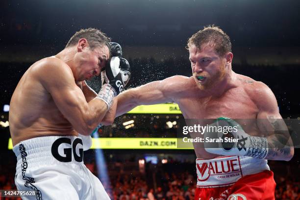 Canelo Alvarez lands a punch against Gennadiy Golovkin in round twelve of the fight for the Super Middleweight Title at T-Mobile Arena on September...