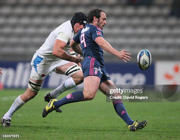 Julien Dupuy of Stade Francais clears the ball upfield during the Amlin Challenge Cup quarter final match between Stade Francais and Exeter Chiefs at...