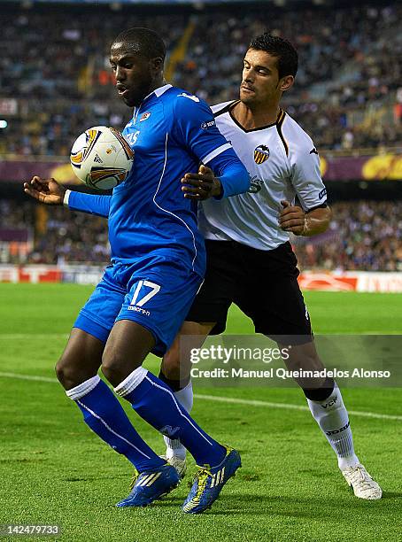 Ricardo Costa of Valencia CF competes for the ball with Jozy Altidore of AZ Alkmaar during the UEFA Europa League quarter final second leg match...