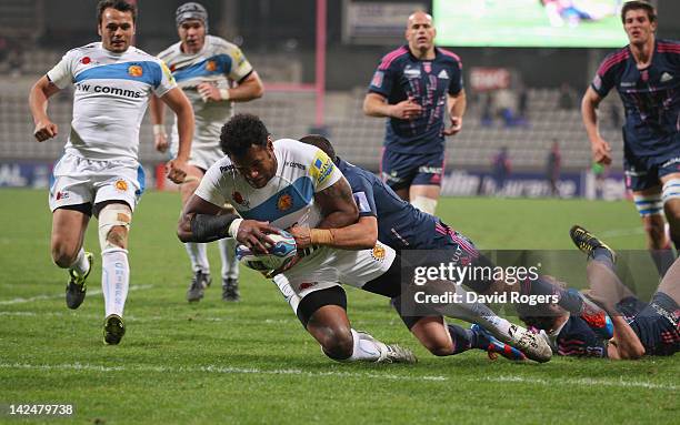 Sireli Naqelevuki of Exeter dives over for a try during the Amlin Challenge Cup quarter final match between Stade Francais and Exeter Chiefs at Stade...