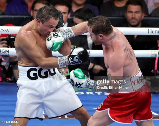 Canelo Alvarez hits Gennadiy Golovkin in the 10th round of their super middleweight title fight at T-Mobile Arena on September 17, 2022 in Las Vegas,...