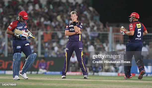 Kolkata Knight Riders bowler Brett Lee looking upset as Delhi Daredevil batsmen Virender Sehwag and Aaron Finch are taking run during Indian Premier...