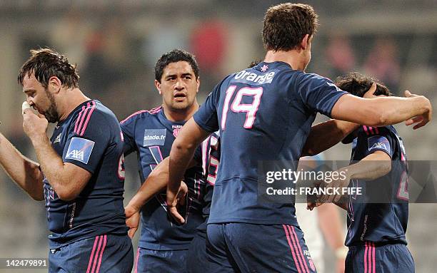 Stade Français' players celebrate at the end of the European Challenge Cupthe European Challenge Cup quarter final rugby union match Stade Francais...