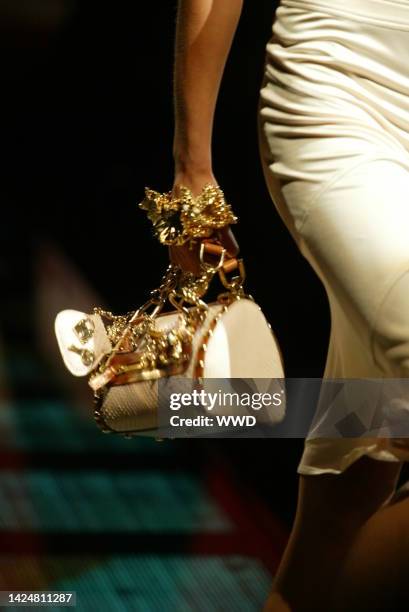 Versace Spring Collection 2005 A model walks down the runway at the Spring 2005 Versace show in ...