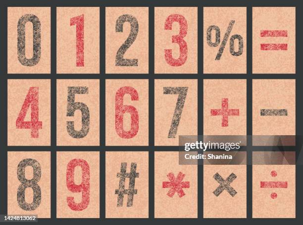 stamped old numbers and symbols on craft cardboard - black craft paper stock illustrations