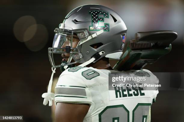 Tight end Max Reese of the Eastern Michigan Eagles holds the 51 pound pipe wrench during the second half of the NCAAF game at Sun Devil Stadium on...