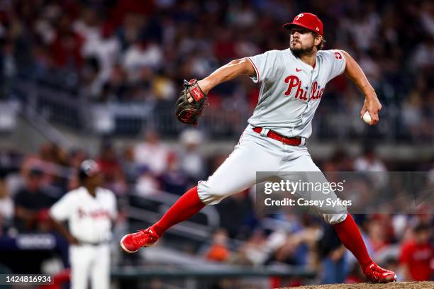 Brad Hand of the Philadelphia Phillies delivers a pitch in the bottom of the eighth inning of a game against the Atlanta Braves at Truist Park on...