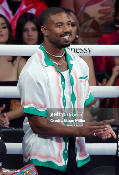 Actor Michael B. Jordan stands in the ring as part of Canelo Alvarez's entourage as national anthems are performed before the super middleweight...