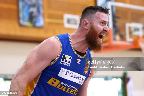 Aron Baynes of the Bullets gives instructions to his teammates during the NBL Blitz match between Brisbane Bullets and New Zealand Breakers at Darwin...