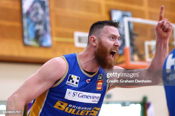 Aron Baynes of the Bullets gives instructions to his teammates during the NBL Blitz match between Brisbane Bullets and New Zealand Breakers at Darwin...