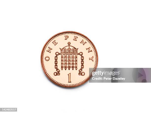 extreme close-up of one penny coin with copy space - uk cash stock pictures, royalty-free photos & images