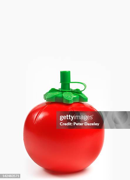 tomato ketchup container with copy space - tomato sauce stock pictures, royalty-free photos & images