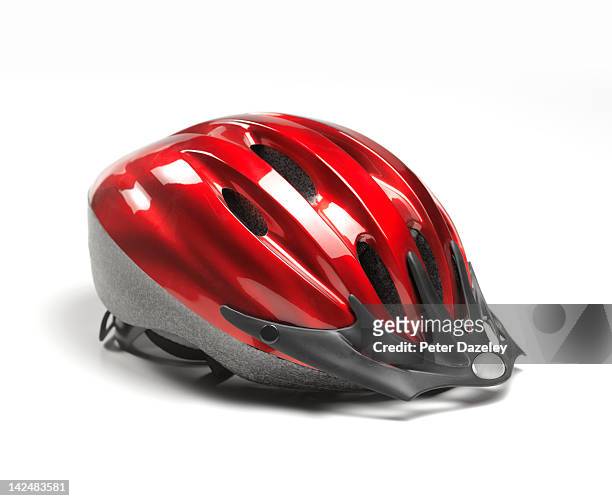 close up of red cycle helmet - cycling helmet stock pictures, royalty-free photos & images