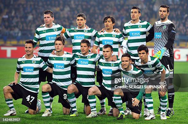 Sporting Lisbon's players pose for a photograph before their UEFA Europa League quarter-final football match against FC Metalist Kharkiv, in Kharkiv,...