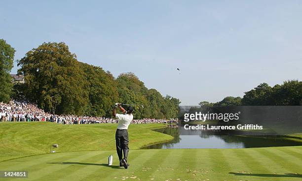 Tiger Woods of the United States hits his tee-shot on the third hole during the third round of the American Express Championship at Mount Juliet Golf...