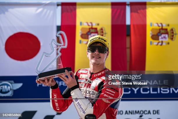Moto3 rider and race winner Izan Guevara of Spain and GASGAS Aspar Team with his trophy on the podium during the race of the MotoGP Gran Premio...