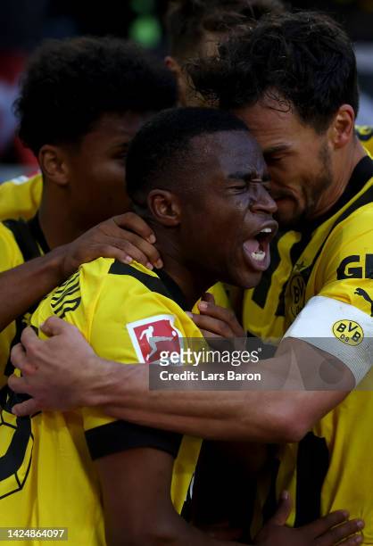 Youssoufa Moukoko of Dortmund celebrates after scoring his teams first goal during the Bundesliga match between Borussia Dortmund and FC Schalke 04...