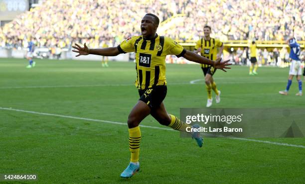 Youssoufa Moukoko of Dortmund celebrates after scoring his teams first goal during the Bundesliga match between Borussia Dortmund and FC Schalke 04...