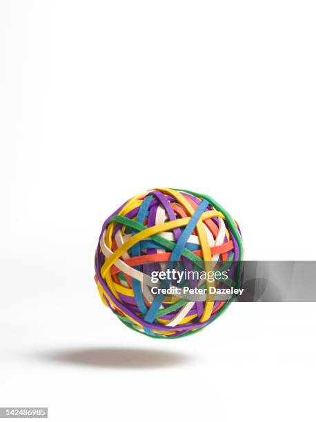 bouncing ball of elastic bands - elastiekje stockfoto's en -beelden
