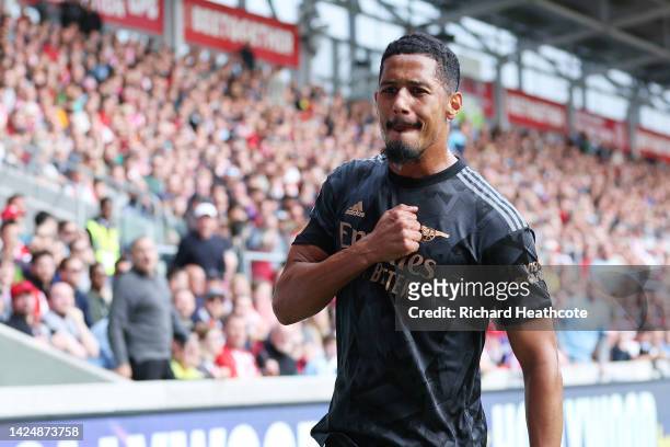 William Saliba of Arsenal celebrates after scoring their side's first goal during the Premier League match between Brentford FC and Arsenal FC at...