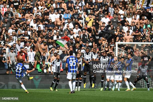 Nicolo Barella of FC Internazionale scores their side's first goal from a free kick during the Serie A match between Udinese Calcio and FC...