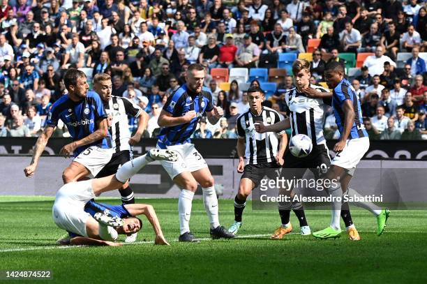 Milan Skriniar of FC Internazionale scores an own goal for the Udinese Calcio first goal during the Serie A match between Udinese Calcio and FC...