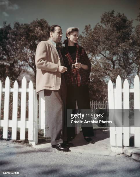American actor Humphrey Bogart with his wife, actress Lauren Bacall, circa 1950.