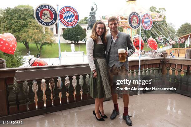 Thomas Müller of FC Bayern Muenchen attends with Lisa Müller the Oktoberfest at Kaefer Wiesenschaenke tent at Theresienwiese on September 18, 2022 in...