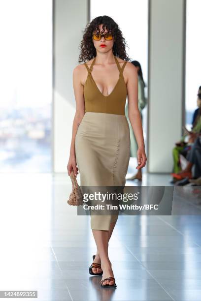 Model walks the runway during the Rejina Pyo show during London Fashion Week September 2022 on September 18, 2022 in London, England.