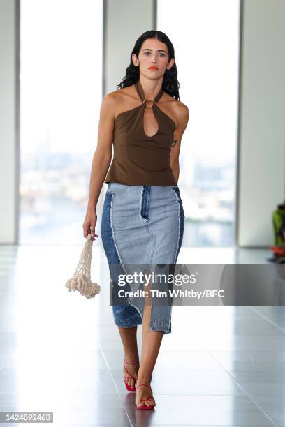 Model walks the runway during the Rejina Pyo show during London Fashion Week September 2022 on September 18, 2022 in London, England.