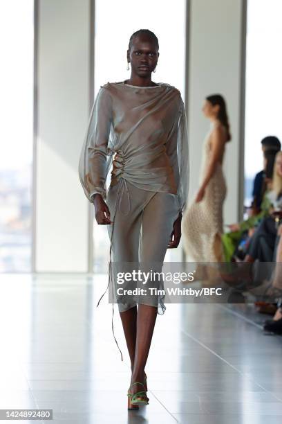 Model walks the runway during the Rejina Pyo show during London Fashion Week September 2022 on September 18, 2022 in London, England.