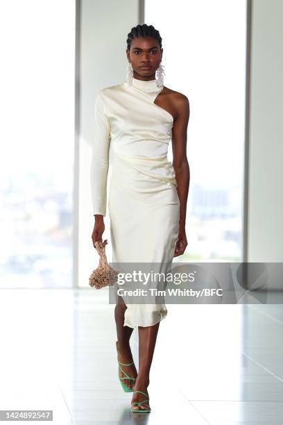 Model walks the runway during the Rejina Pyo show during London Fashion Week September 2022 on September 18, 2022 in London, England.