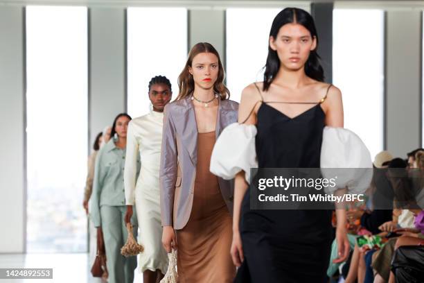 Models walk the runway during the Rejina Pyo show during London Fashion Week September 2022 on September 18, 2022 in London, England.