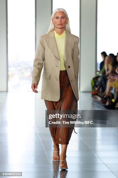 Model walks the runway during the Rejina Pyo show during London Fashion Week September 2022 on September 18, 2022 in London, England.