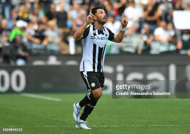 Tolgay Arslan of Udinese Calcio celebrates after scoring their side's third goal during the Serie A match between Udinese Calcio and FC...