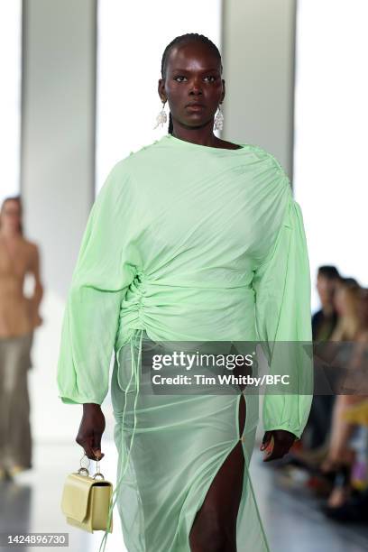 Model walks the runway during the Rejina Pyo show during London Fashion Week September 2022 on September 18, 2022 in London, England.